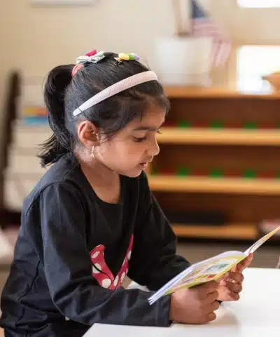 Montessori Elementary Girl Reading