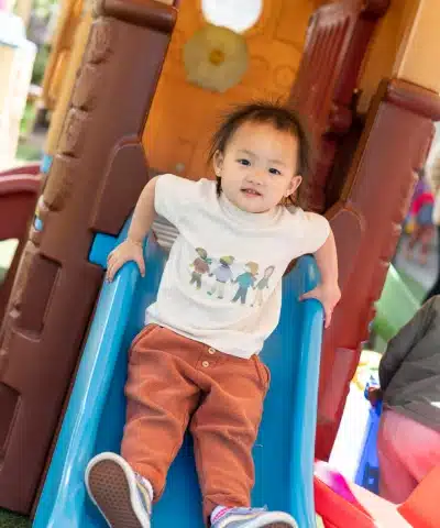 Montessori Toddler Going Down Slide