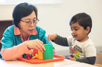 Montessori Toddler Working With The Teacher